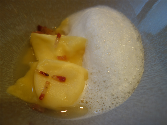 liquid Parmesan ravioli with horseradish foam